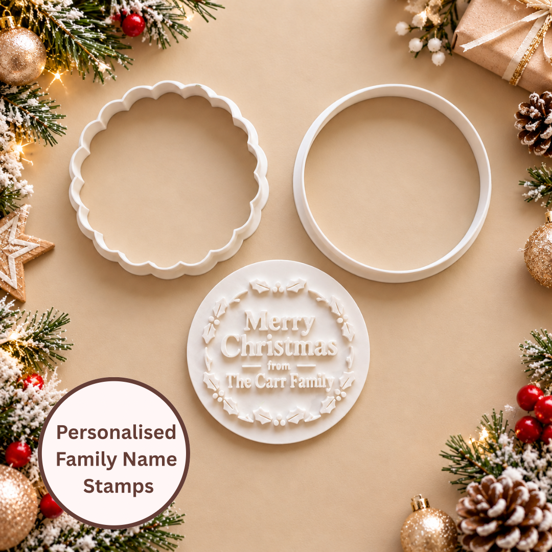 Personalised Christmas family surname cookie stamps featuring festive bows, Christmas tree, stars and traditional holly wreath.