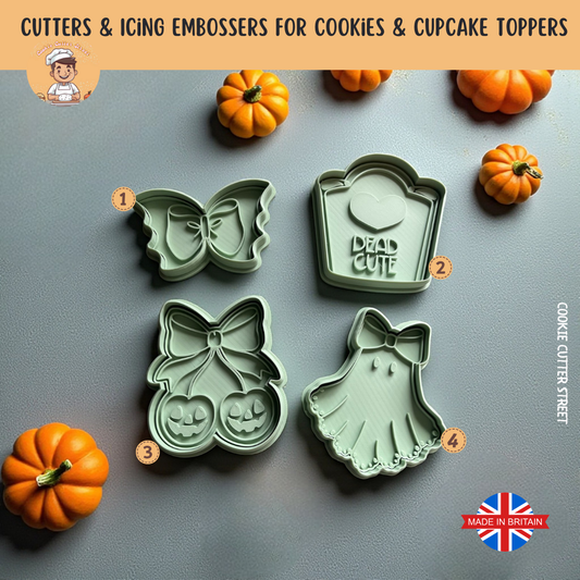 Set of cookie cutters with Halloween designs on a grey background with pumpkins.
