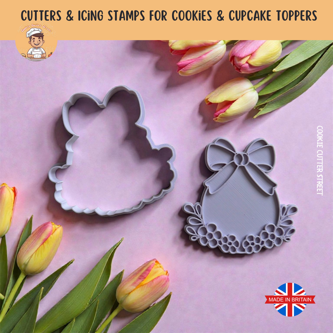Floral easter Egg with Bow cookie cutters with decorative designs on a pink background with tulips.