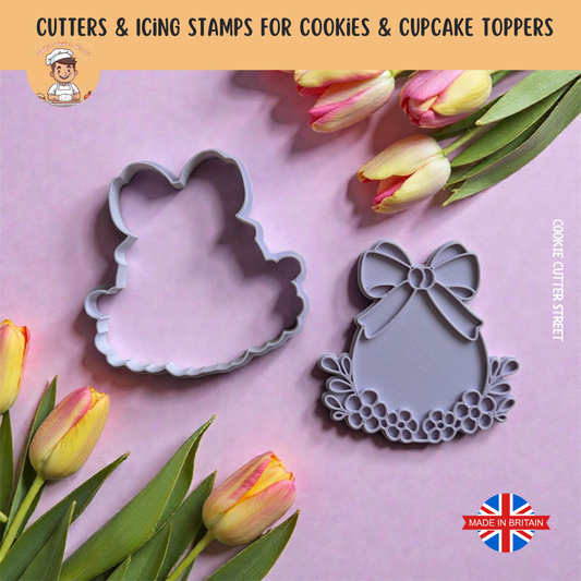 Floral easter Egg with Bow cookie cutters with decorative designs on a pink background with tulips.