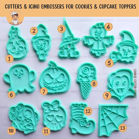 Set of halloween cookie cutters with various designs on a light gray background.