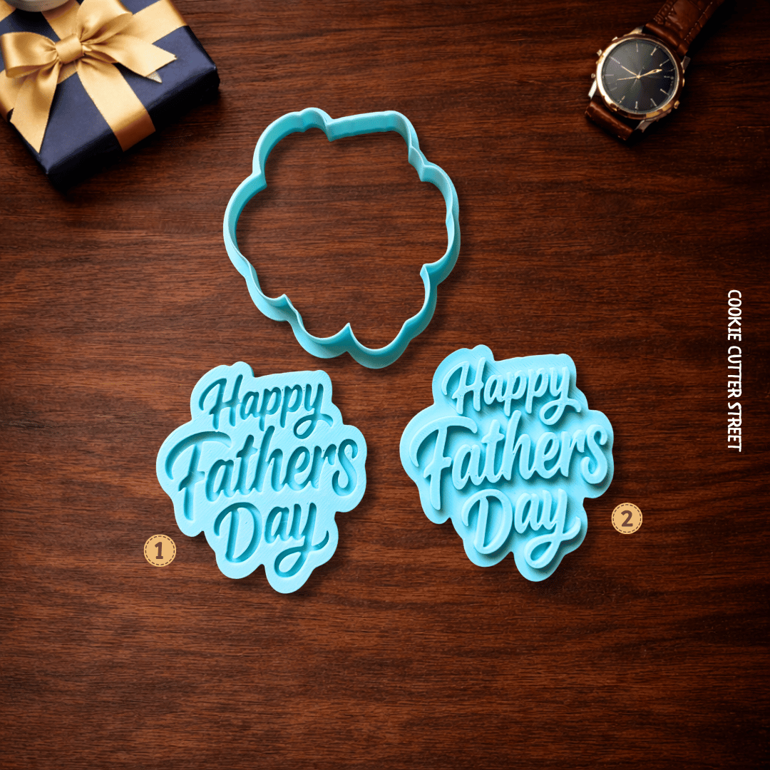 Two 'Happy Fathers Day' cookie cutters on a wooden surface with a gift and watch in the background.