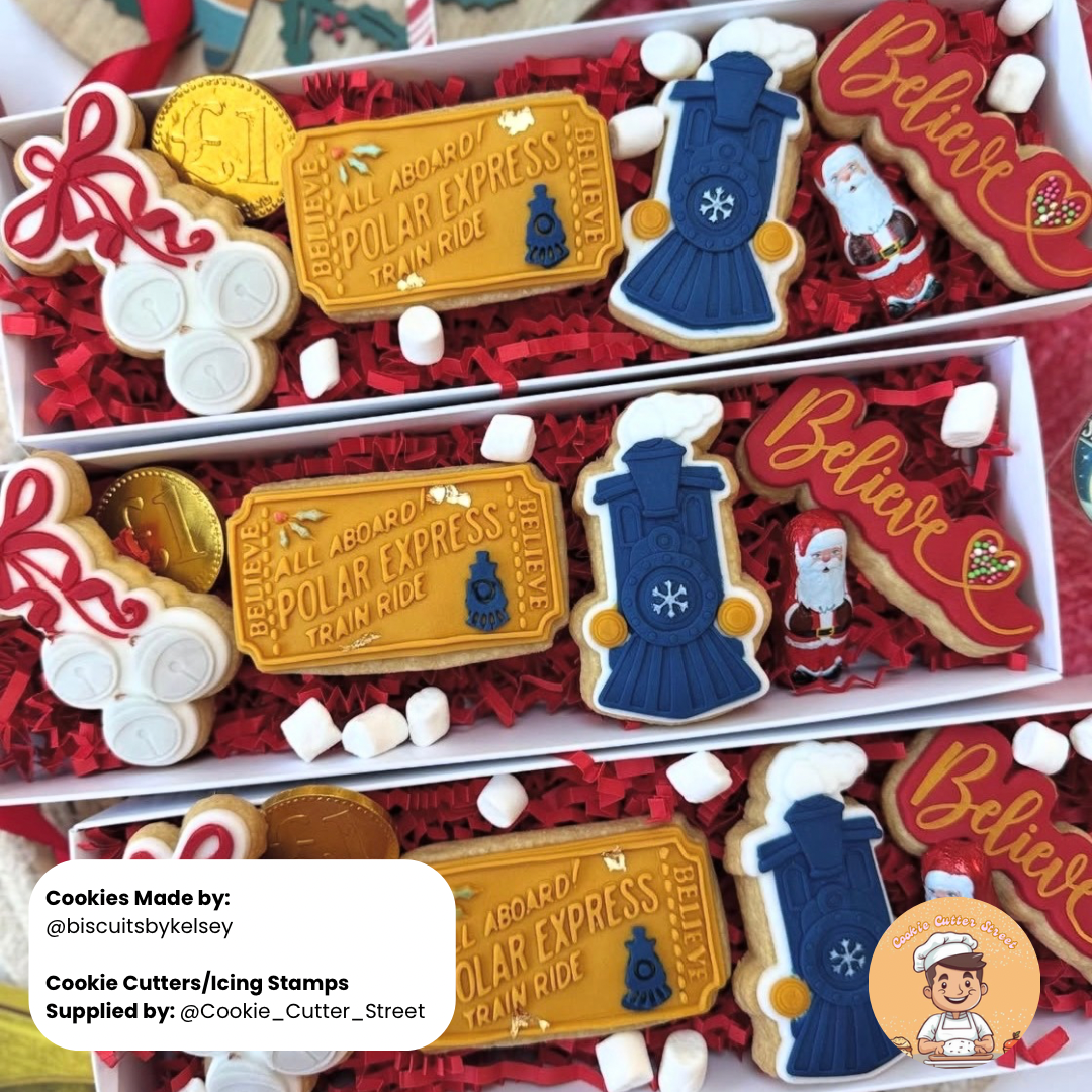 Collection of Christmas-themed cookies in a box with visible branding.