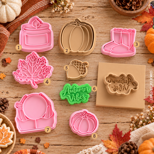 Autumn and fall icing stamps featuring pumpkin, candle, Wellington boots, maple leaf, acorn, Autumn Vibes lettering, cosy mug and mini pumpkin by Cookie Cutter Street.