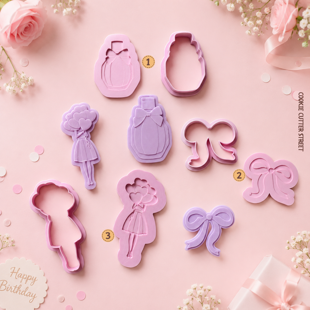 Girls birthday multi-level cookie cutters and icing stamps featuring birthday girl with heart balloons, perfume bottle and pretty bow designs.