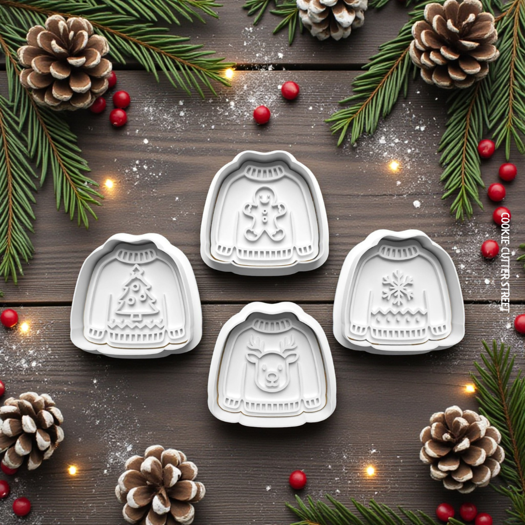 Christmas jumper cookie cutters and imprint icing stamps featuring Christmas tree, gingerbread man, reindeer and snowflake designs.