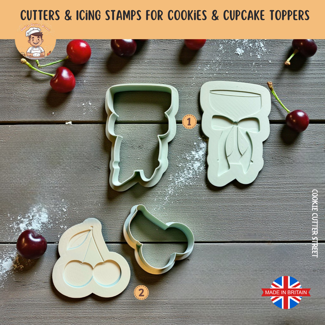 Martini glass cookie cutter with bow and cherries multi-level icing stamp creating a raised layered effect.