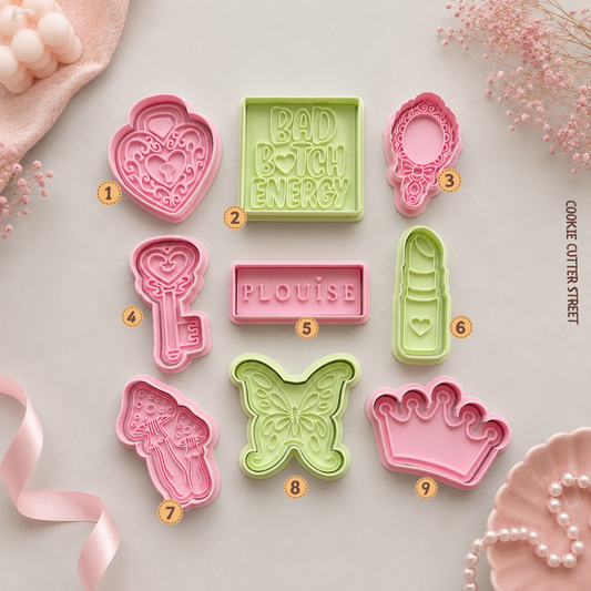 Beauty-themed cookie cutter collection featuring lipstick, vanity mirror, butterfly, crown, quote plaque and personalised name designs for glam celebration bakes.