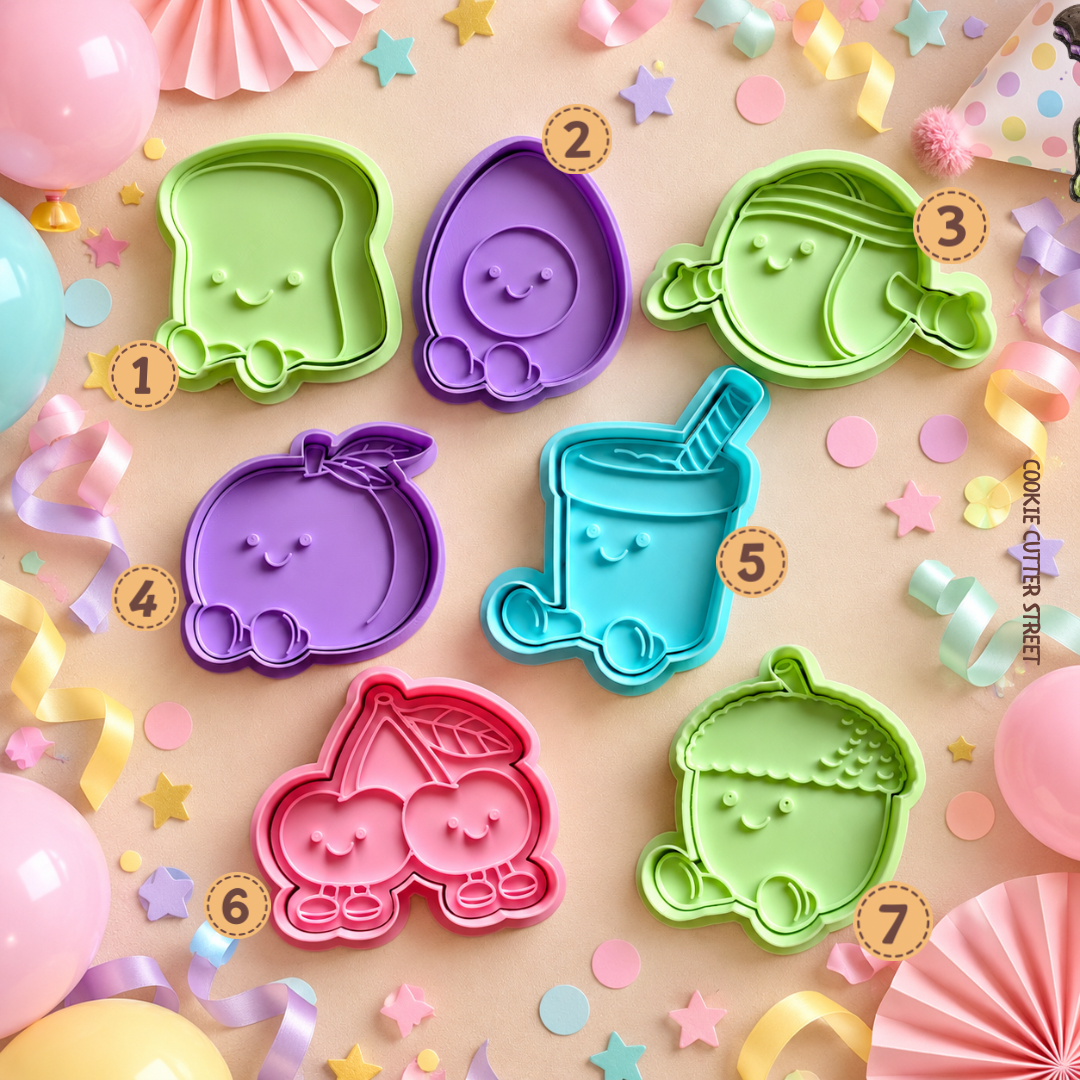 Seven cute kawaii character icing stamps featuring toast, boiled egg, tennis ball, peach, milkshake, cherries and acorn by Cookie Cutter Street.