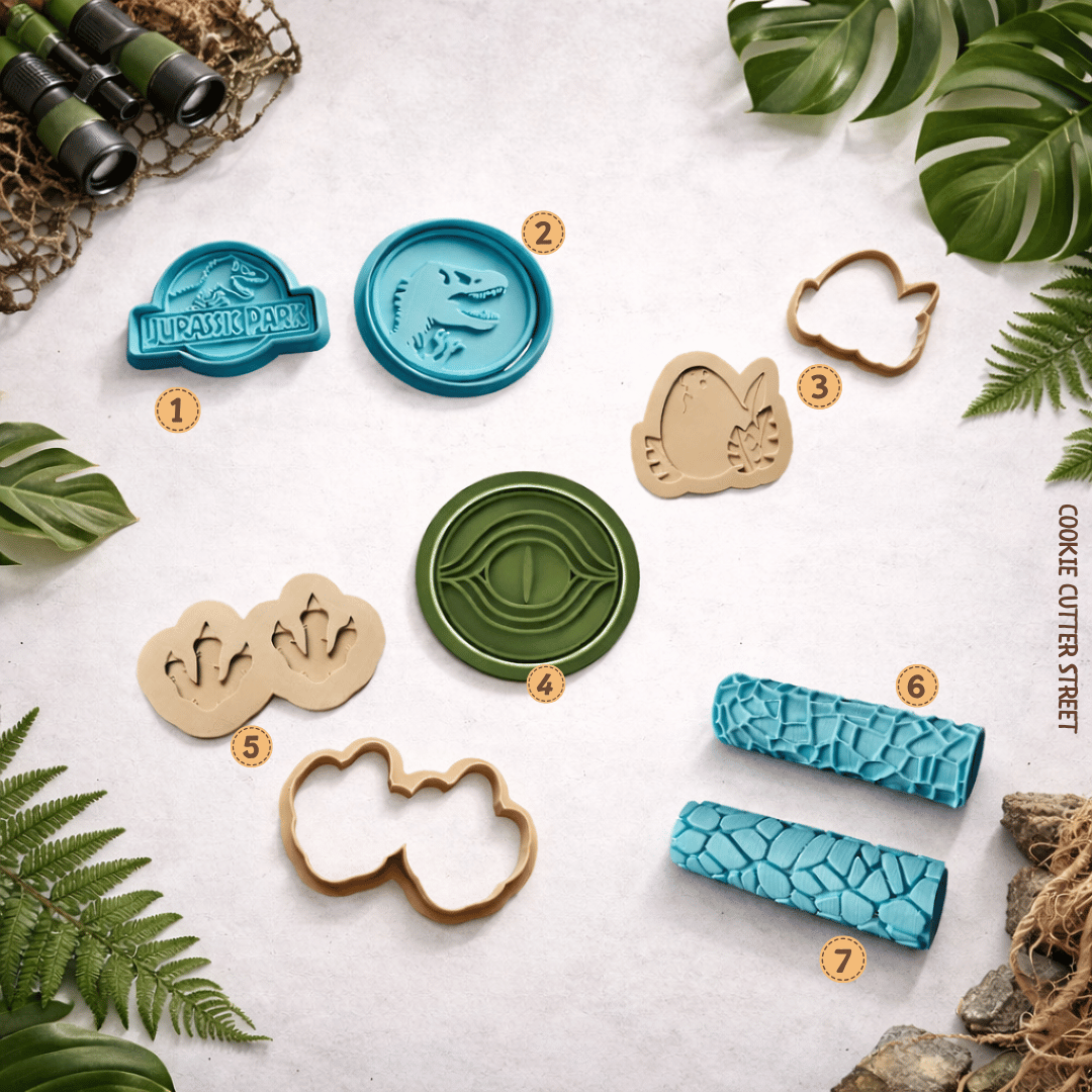 Dinosaur themed cookie cutters, embossers and texture rollers featuring Jurassic inspired designs, dinosaur footprints, egg, eye and reptile skin textures.