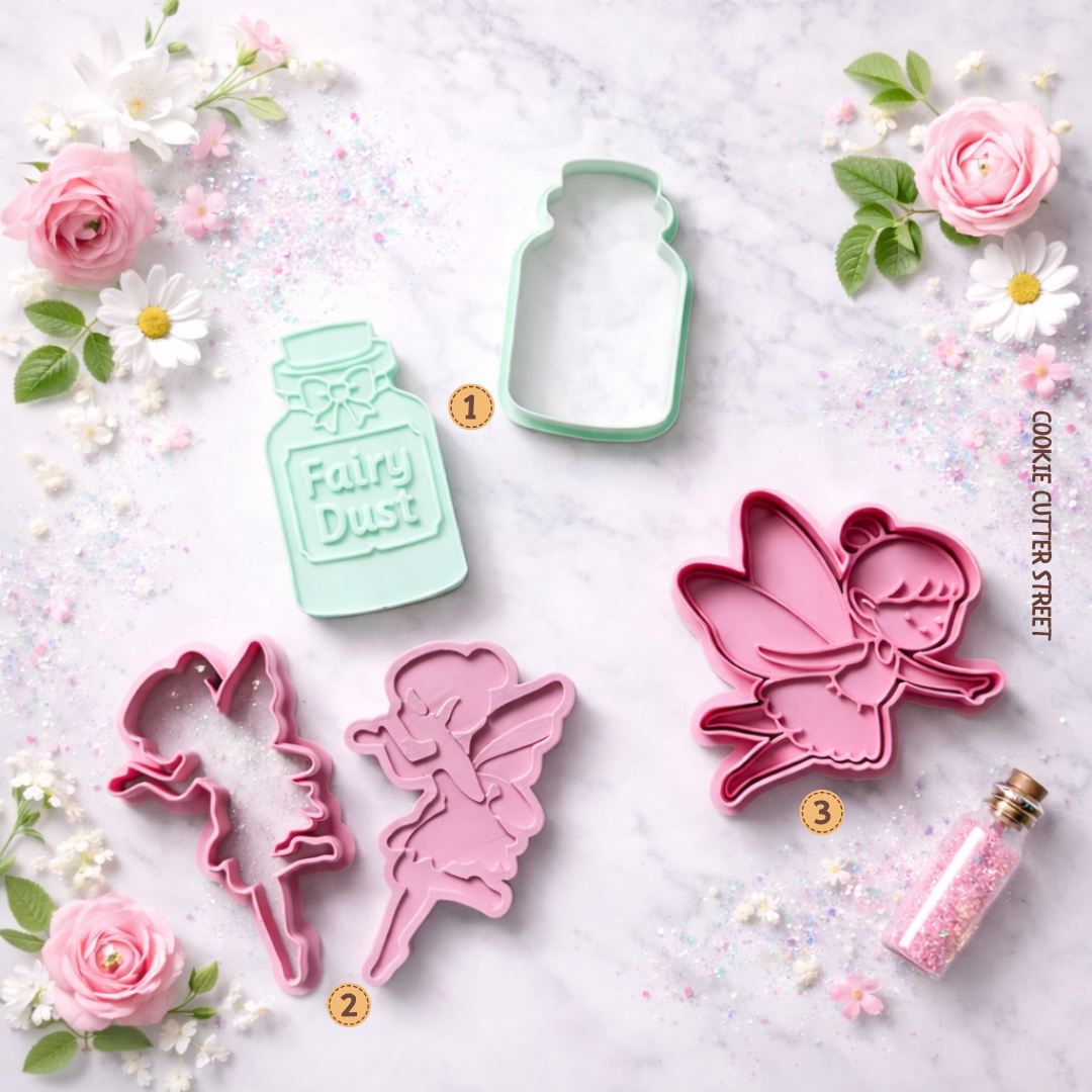 Set of fairy-themed cookie cutters on a decorative background with flowers and sprinkles.