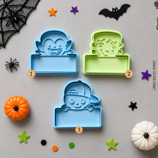 Personalised Halloween name plaque imprint cookie stamps and cutters featuring Dracula, Frankenstein and skeleton characters with blank spaces for custom names or messages