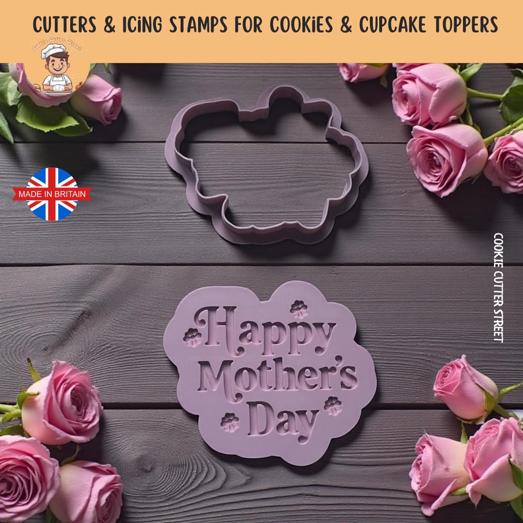 Cookie cutters with 'Happy Mother's Day' stamp on a wooden surface with pink roses.