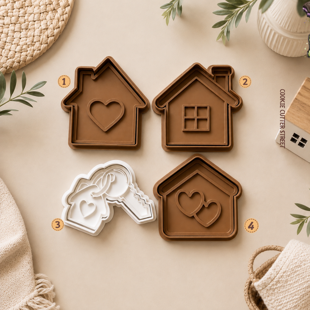 New Home cookie cutters and imprint icing stamps featuring house, heart, window and new house key designs for housewarming cookies.