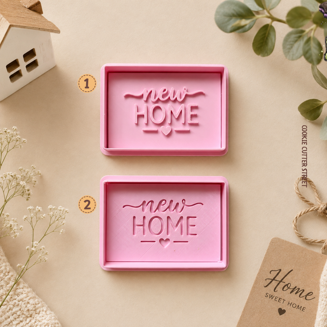 New Home message cookie icing stamps with heart detail, available in imprint and raised pop-out styles for housewarming and moving home biscuits.