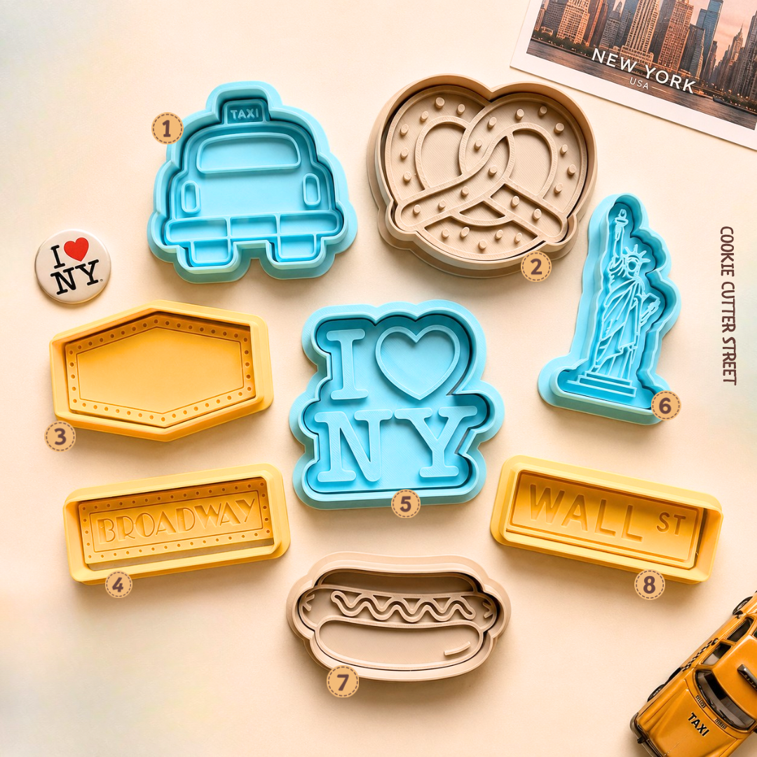 New York cookie cutter and stamp collection featuring taxi, pretzel, Broadway, Statue of Liberty, Wall Street, hot dog and I Love NY designs.