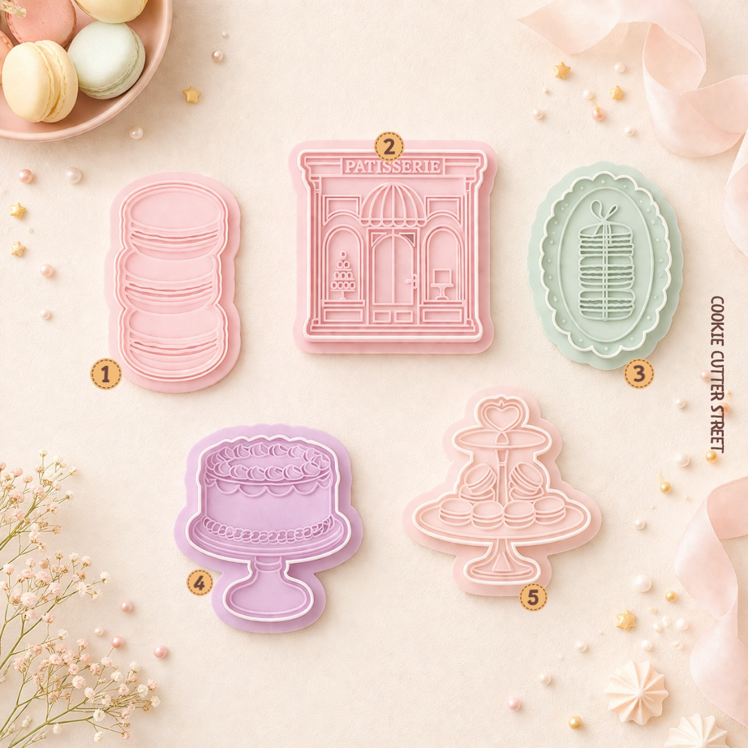 Patisserie cookie cutter and embosser set with macaron, cake, and bakery storefront designs for elegant fondant and biscuit decorating.
